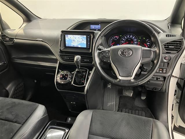 ヴォクシー ＺＳ　煌ＩＩＩ　プリクラッシュ　スマートキ　アイスト　ＤＶＤ再生機能　記録簿付き　横滑り防止装置　ナビＴＶ　アルミ　三列シート　盗難防止　オートエアコン　キーレス　ＥＴＣ装備　パワステ　メモリナビ　クルコン　ＡＢＳ（5枚目）