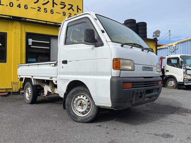 キャリイトラック ＫＡ　パートタイム４ＷＤ　三方開鳥居　ＡＭラジオ　荷台灯　保証書　点検記録簿（4枚目）