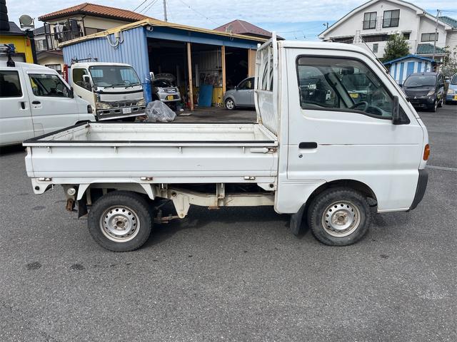 キャリイトラック ＫＡ　パートタイム４ＷＤ　三方開鳥居　ＡＭラジオ　荷台灯　保証書　点検記録簿（5枚目）