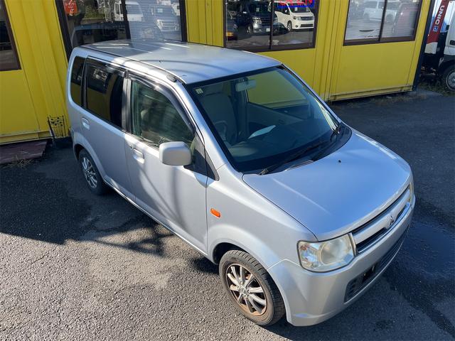 ｅＫワゴン Ｍ　キーレスエントリー　ＥＴＣ　衝突安全ボディ　純正オーディオ　Ｗエアバッグ　レベライザー　社外１３インチアルミ　点検記録簿　保証書　取扱説明書（5枚目）