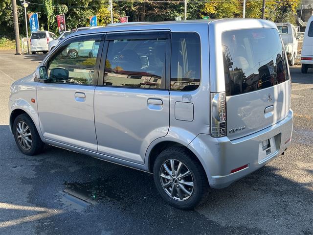 ｅＫワゴン Ｍ　キーレスエントリー　ＥＴＣ　衝突安全ボディ　純正オーディオ　Ｗエアバッグ　レベライザー　社外１３インチアルミ　点検記録簿　保証書　取扱説明書（9枚目）