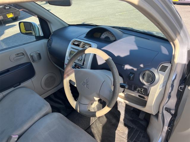 ｅＫワゴン Ｍ　キーレスエントリー　ＥＴＣ　衝突安全ボディ　純正オーディオ　Ｗエアバッグ　レベライザー　社外１３インチアルミ　点検記録簿　保証書　取扱説明書（15枚目）