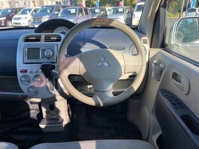 ｅＫワゴン Ｍ　キーレスエントリー　ＥＴＣ　衝突安全ボディ　純正オーディオ　Ｗエアバッグ　レベライザー　社外１３インチアルミ　点検記録簿　保証書　取扱説明書（16枚目）