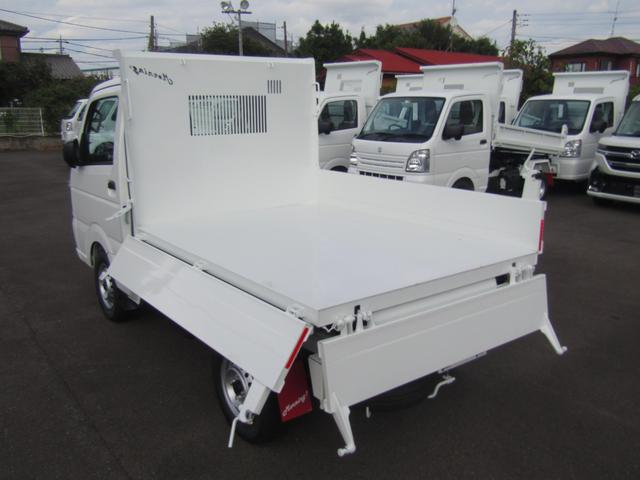 キャリイトラック 　新明和製強化ダンプ・４ＷＤ・５ＭＴ・あおり２５０ｍｍ・電動油圧・強化ヒンジ・脱落防止ピン・前壁プロテクター式鳥居・土砂禁・強化リアサス・リアパーキングセンサー・オートライト・キーレス・助手席エアＢ（8枚目）