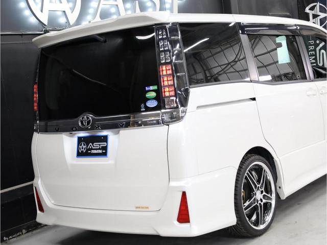 ヴォクシー ＺＳ　両側自動スライドドア　純正９型ＳＤナビ　ＷＯＲＫランベック１９インチＡＷ　ローダウンサス　フロントスポイラー　地デジフルセグ　バックカメラ　スマートキー　ＬＥＤヘッドライト（19枚目）