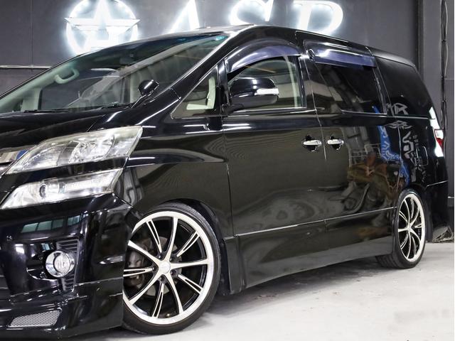 ヴェルファイア ２．４Ｚ　後期型　サンルーフ　両側自動スライドドア　カロッツェリアナビ　社外２０インチＡＷ　ＴＥＩＮ車高調　地デジフルセグ　バックカメラ　後席モニター　スマートキー　クリアランスソナー　黒革調シートカバー（8枚目）