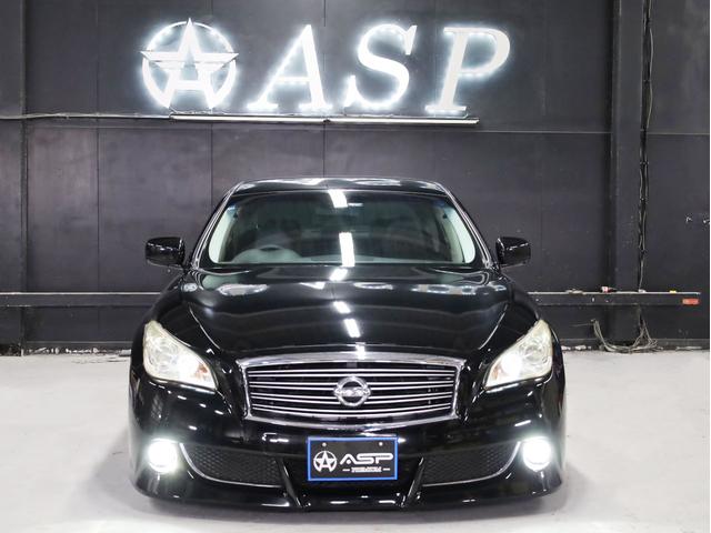 フーガ ２５０ＧＴ　Ａパッケージ　ブラックハーフレザー　ＯＰエアロバンパー　ＲＡＹＳホムラ２０インチＡＷ　新品フルタップ車高調　純正メーカーナビ　地デジフルセグ　バックカメラ　スマートキー　パワーシート（10枚目）