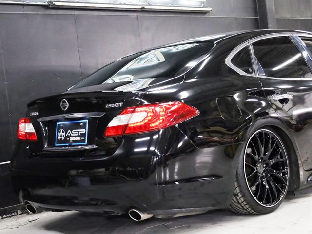 フーガ ２５０ＧＴ　Ａパッケージ　ブラックハーフレザー　ＯＰエアロバンパー　ＲＡＹＳホムラ２０インチＡＷ　新品フルタップ車高調　純正メーカーナビ　地デジフルセグ　バックカメラ　スマートキー　パワーシート（19枚目）