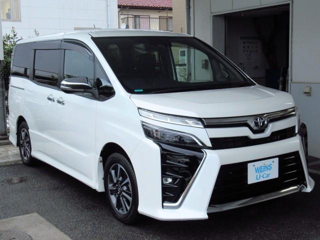 ヴォクシー ZS 煌III プリクラッシュ スマートキ アイスト DVD再生機能 横滑り防止装置 ナビTV アルミ 三列シート 盗難防止 オートエアコン キーレス ETC装備 パワステ メモリナビ クルコン LEDヘッドライト(2枚目)