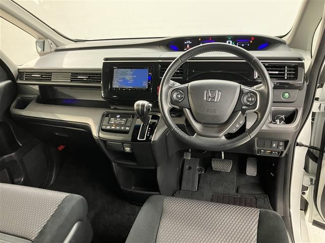 ステップワゴンスパーダ スパーダ　ホンダセンシング　ＡＷ　盗難防止　助手席エアバッグ　Ｗパワスラ　メモリナビ　記録簿有　地デジ　サイドエアバッグ　ＬＥＤライト　横滑り防止システム　オートエアコン　リアカメラ　ナビ＆ＴＶ　三列シート　アイドリングＳ（5枚目）