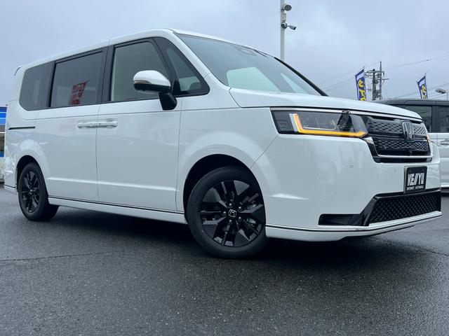 ステップワゴン e:HEVスパーダ/走行10KM/デーラーOPデカナビ 両側パワースライドドア/ハーフレザーシート/電動リアゲート/CDDVD再生/12セグ/BT/アラウンドビューモニター/フリップダウンモニター/LEDヘッドライト/フォグ/スマートキー/プッシュスタート(6枚目)