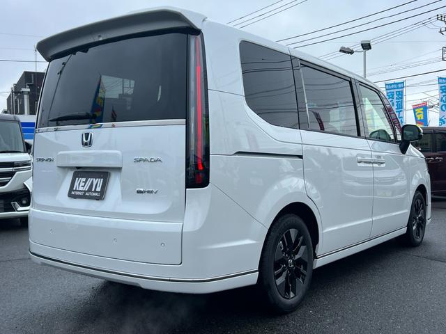 ステップワゴン e:HEVスパーダ/走行10KM/デーラーOPデカナビ 両側パワースライドドア/ハーフレザーシート/電動リアゲート/CDDVD再生/12セグ/BT/アラウンドビューモニター/フリップダウンモニター/LEDヘッドライト/フォグ/スマートキー/プッシュスタート(8枚目)