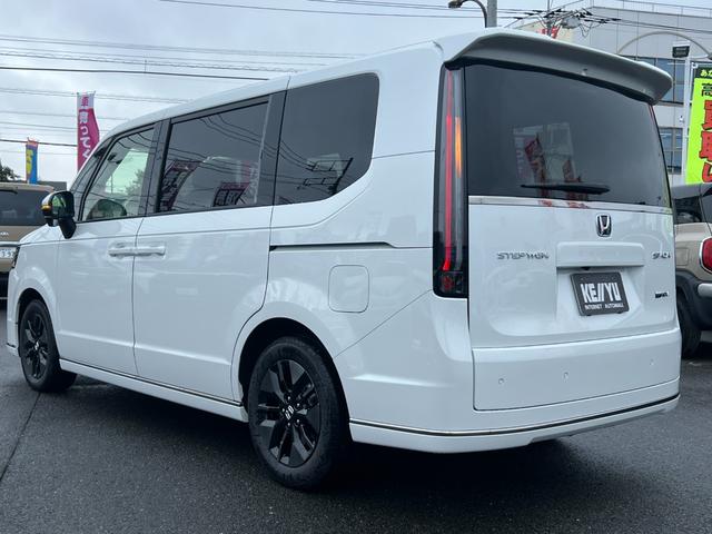 ステップワゴン e:HEVスパーダ/走行10KM/デーラーOPデカナビ 両側パワースライドドア/ハーフレザーシート/電動リアゲート/CDDVD再生/12セグ/BT/アラウンドビューモニター/フリップダウンモニター/LEDヘッドライト/フォグ/スマートキー/プッシュスタート(10枚目)