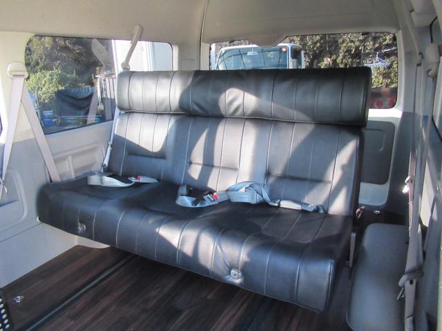 ハイエースワゴン グランドキャビン 4型仕様 LEDヘッドライト REVOシート2脚 車いす移動車 ナビ フルセグTV リアモニター TAW18インチAWキーレス エアロ 9人乗り(5枚目)