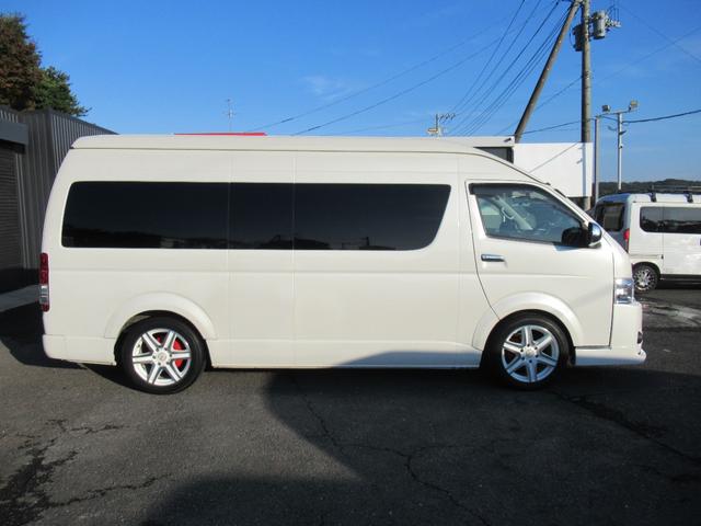 ハイエースワゴン グランドキャビン 4型仕様 LEDヘッドライト REVOシート2脚 車いす移動車 ナビ フルセグTV リアモニター TAW18インチAWキーレス エアロ 9人乗り(11枚目)