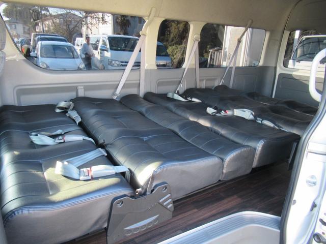 ハイエースワゴン グランドキャビン 4型仕様 LEDヘッドライト REVOシート2脚 車いす移動車 ナビ フルセグTV リアモニター TAW18インチAWキーレス エアロ 9人乗り(32枚目)