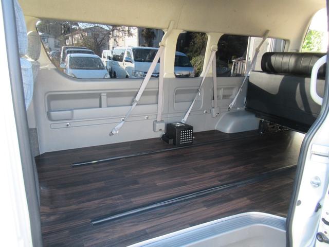 ハイエースワゴン グランドキャビン 4型仕様 LEDヘッドライト REVOシート2脚 車いす移動車 ナビ フルセグTV リアモニター TAW18インチAWキーレス エアロ 9人乗り(34枚目)