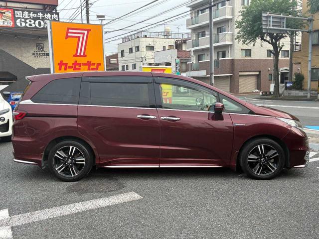 オデッセイハイブリッド ハイブリッドアブソルート・ホンダセンシンアドバンスＰ　純正インターナビ　フリップダウンモニター　アラウンドビューモニター　スマートパーキング　両側パワースライドドア　ＬＥＤ　純正１７インチＡＷ　２列目ロールサンシェード　パワーシート　８人乗り（26枚目）