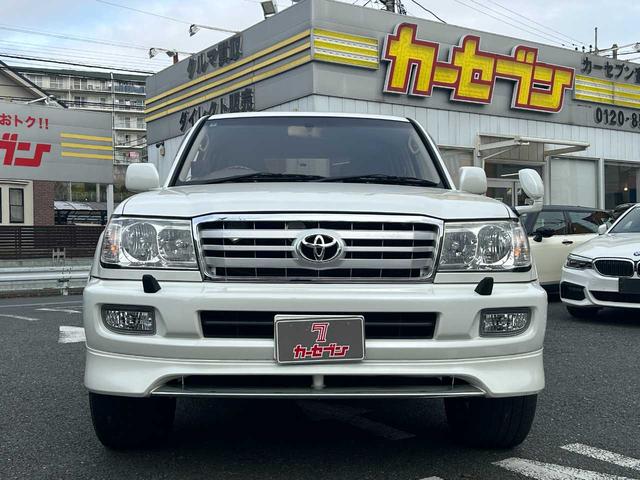 ランドクルーザー１００ ＶＸリミテッド　ユーザー買取車／純正ナビ／ＲＡＹＳホイール／バックカメラ／クルコン／ＴＶ／ＤＶＤ／オートライト／ドラレコ／木目調／構造変更５人乗り（24枚目）