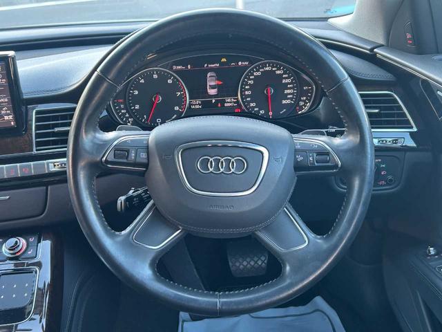 Ａ８ ３．０ＴＦＳＩクワトロ　コンフォートＰＫＧ　本革シート　シートヒーター　ＢＯＳＥサウンド　前席シートベンチレーション　オートクローザー　ＴＶ　バックモニター　ＥＴＣ　パワーバックドア　純正ナビ　スーパーチャージャー（4枚目）