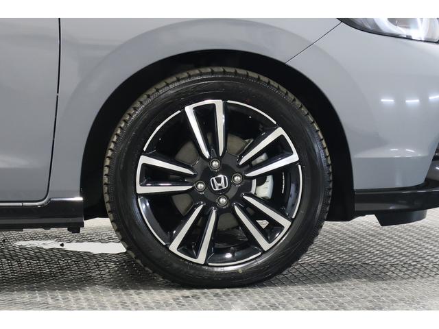 フィット ｅ：ＨＥＶＲＳ　ホンダ認定中古車　２年保証　デモカー　禁煙車　運転支援　衝突軽減ブレーキ（ＣＭＢＳ）　誤発進抑制機能　渋滞追従付クルコン（ＡＣＣ）　ドラレコ　コネクトナビ　バックカメラ　ＥＴＣ　フルセグＴＶ　ＵＳＢ（26枚目）