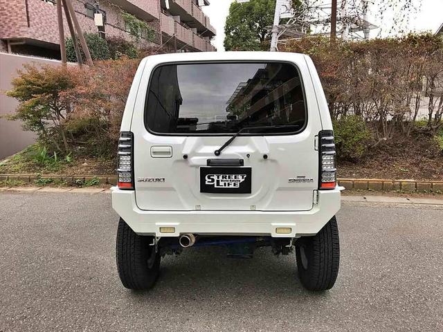 ジムニーシエラ ランドベンチャー　５速マニュアル　最終９型　リフトアップ　ショートバンパー　ラテラルロッド　社外マフラー　ナビＴＶ　ＥＴＣ　車検整備付　走行５．６万ｋｍ　社外品有（3枚目）