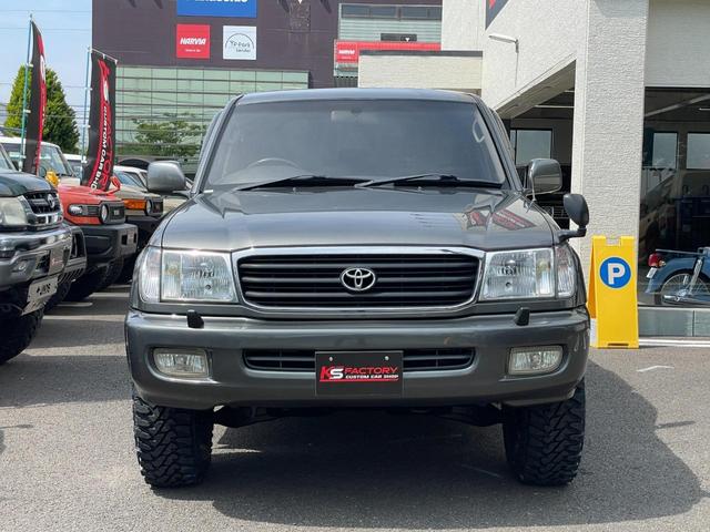 ランドクルーザー１００ ＶＸリミテッド　新品ジオランダーＭＴタイヤ／新品ＭＬＪエクストリームＪＤスロット１６ＡＷ／新品ウッドステアリング／新品シフトノブ／リアデフロック付き／４速ＡＴ／ディーゼルターボ／クールＢＯＸ／シートヒーター／ＡＨＣ付（5枚目）