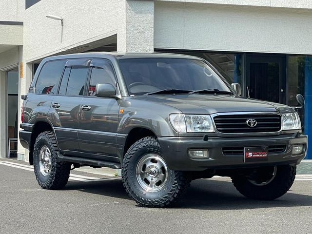 ランドクルーザー１００ ＶＸリミテッド　新品ジオランダーＭＴタイヤ／新品ＭＬＪエクストリームＪＤスロット１６ＡＷ／新品ウッドステアリング／新品シフトノブ／リアデフロック付き／４速ＡＴ／ディーゼルターボ／クールＢＯＸ／シートヒーター／ＡＨＣ付（7枚目）
