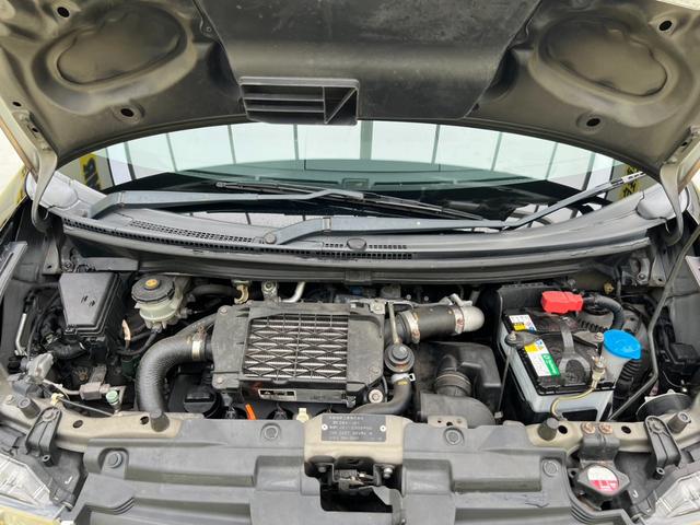 ゼストスパーク Ｗターボ　ナビ　ＣＤ　ラジオ　アルミホイール　エアコン・クーラー　パワステ　パワーウィンドウ　運転席エアバック助手席エアバック　ＡＢＳ　ベンチシート　スマートキー　キーレスエントリ－　盗難防止装置（64枚目）