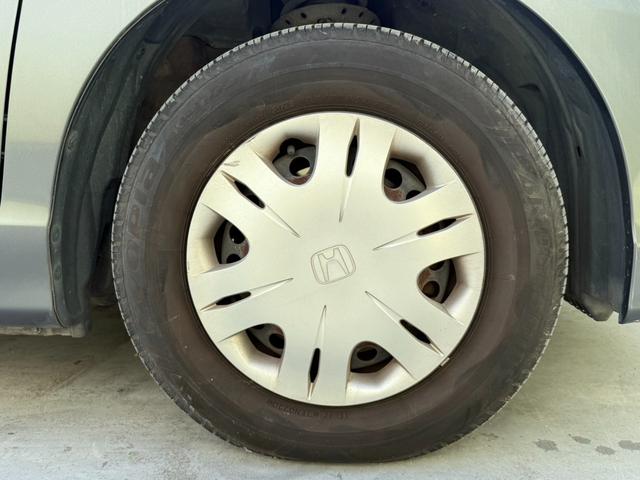 フリード G Lパッケージ 走行距離約7.2万キロ 3列シート 7人乗り 両側電スラ ウォークスルー ナビ バックカメラ ETC CD キーレスエントリー パワーステアリング パワーウィンドウ 運転席助手席エアバック ABS(22枚目)