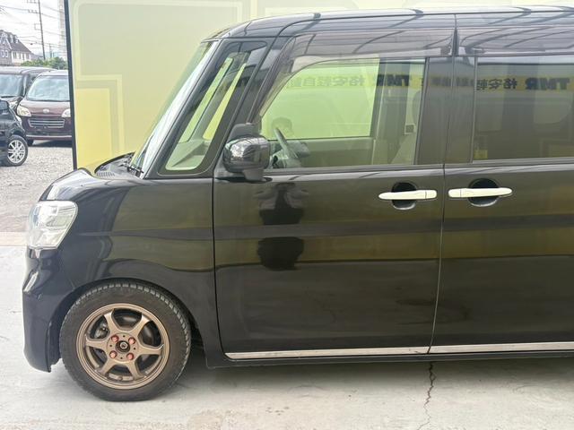 タント L 社外アルミホイール スタッドレスタイヤ ローダウン 両側スライドドア フルフラットシート CD AM FM エアバック 助手席エアバック 運転席エアバック パワーステアリング パワーウィンドウ(15枚目)