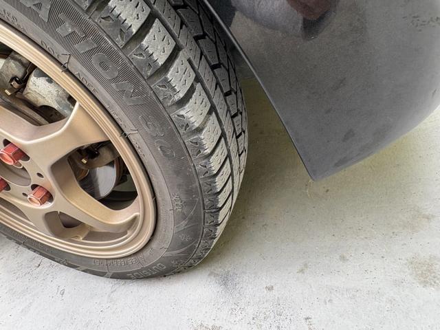 タント L 社外アルミホイール スタッドレスタイヤ ローダウン 両側スライドドア フルフラットシート CD AM FM エアバック 助手席エアバック 運転席エアバック パワーステアリング パワーウィンドウ(25枚目)