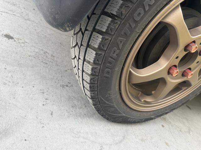 タント L 社外アルミホイール スタッドレスタイヤ ローダウン 両側スライドドア フルフラットシート CD AM FM エアバック 助手席エアバック 運転席エアバック パワーステアリング パワーウィンドウ(27枚目)