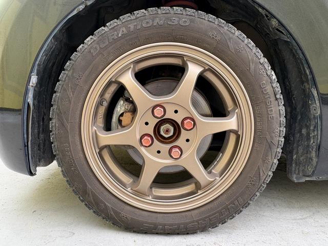 タント L 社外アルミホイール スタッドレスタイヤ ローダウン 両側スライドドア フルフラットシート CD AM FM エアバック 助手席エアバック 運転席エアバック パワーステアリング パワーウィンドウ(28枚目)