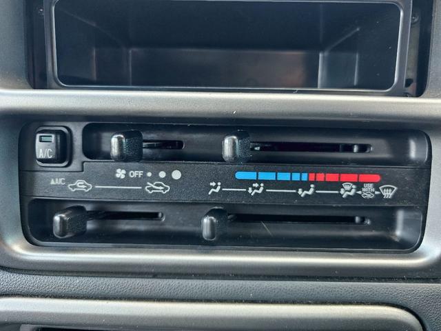 ハイゼットカーゴ デラックスリミテッド　ＫＥＮＷＯＯＤオーディオ・システムバー・ＥＴＣ・キーレス・ＡＢＳ・前席パワーウィンドウ・ＪＯＫＥＲ１３インチアルミホイール（12枚目）