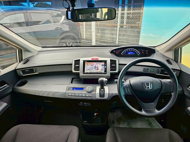 フリード G ジャストセレクション 純正ナビ・後席モニター・バックカメラ・Bluetooth接続・TV・ETC・USB接続・ドライブレコーダー・片側電動スライドドア・キーレス・純正15インチスチールホイール・(4枚目)