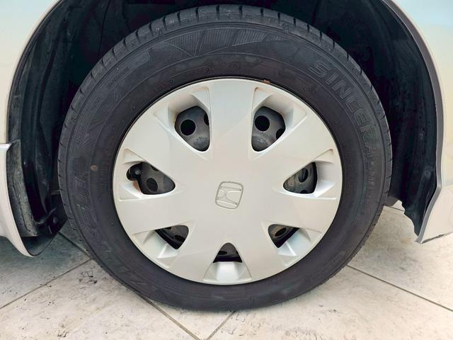 フリード G ジャストセレクション 純正ナビ・後席モニター・バックカメラ・Bluetooth接続・TV・ETC・USB接続・ドライブレコーダー・片側電動スライドドア・キーレス・純正15インチスチールホイール・(57枚目)