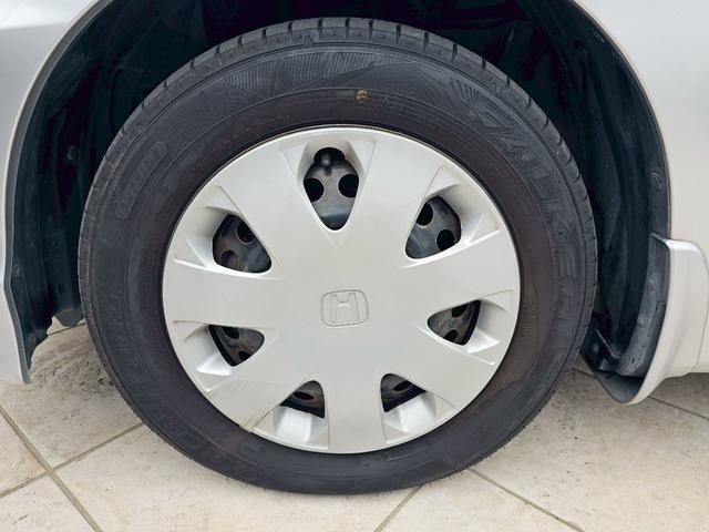 フリード G ジャストセレクション 純正ナビ・後席モニター・バックカメラ・Bluetooth接続・TV・ETC・USB接続・ドライブレコーダー・片側電動スライドドア・キーレス・純正15インチスチールホイール・(58枚目)