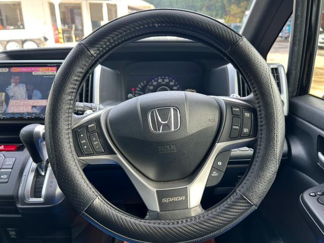 ステップワゴンスパーダ Ｓ　ＥＴＣ　バックカメラ　ＴＶ　両側電動スライドドア　オートライト　ＨＩＤ　スマートキー　アイドリングストップ　３列シート　ＣＶＴ　アルミホイール　盗難防止システム　衝突安全ボディ　ＡＢＳ　ＥＳＣ（23枚目）