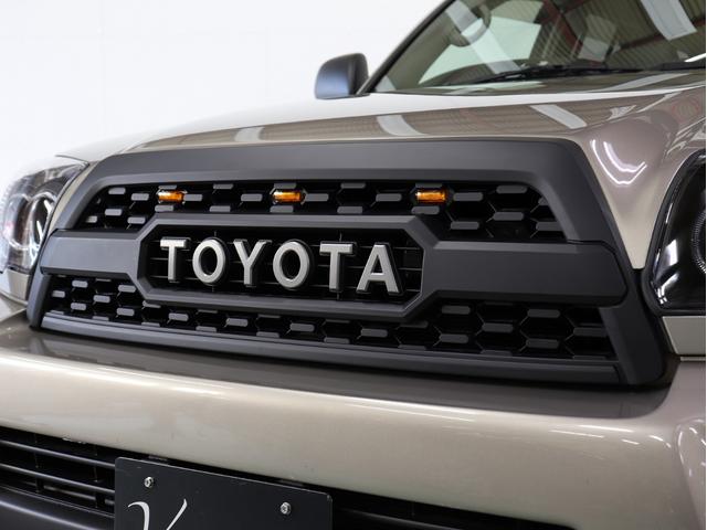 ハイラックスサーフ SSR-X Vセレクション 後期モデル 新品社外アルミホイール 新品BFグッドリッチATタイヤ 新品イカリング付ヘッドライト テールランプブラックアウト 新品LED付USトヨタタコマ仕様グリル マットブラック塗り分け(12枚目)