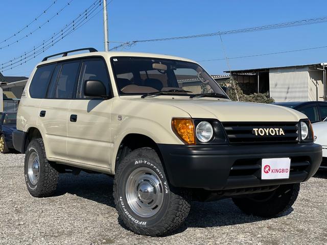 ランドクルーザープラド ＴＸ　ナローボディー　丸目　サンドベージュ色替え済み　クラシックグリル　オルテガ風内張り　専用レザー調シートカバー　ＤＥＡＮ１６インチアルミ　ＢＦグッドリッチＡ／Ｔタイヤ（6枚目）