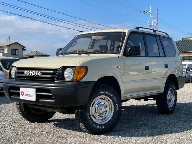 ランドクルーザープラド ＴＸ　ナローボディー　丸目　サンドベージュ色替え済み　クラシックグリル　オルテガ風内張り　専用レザー調シートカバー　ＤＥＡＮ１６インチアルミ　ＢＦグッドリッチＡ／Ｔタイヤ（7枚目）