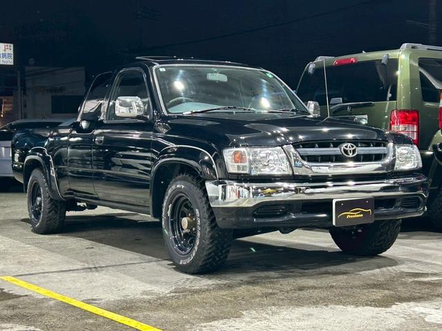 ハイラックススポーツピック エクストラキャブ ユーザー買取 ムーンルーフ エクストラキャブ 社外15インチAW ブロックタイヤ メッキフロントグリル 電動メッキドアミラー 社外オーディオ ETC ABS パワーウィンドウ 1方開荷台 シートカバー(3枚目)