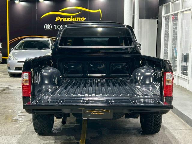 ハイラックススポーツピック エクストラキャブ ユーザー買取 ムーンルーフ エクストラキャブ 社外15インチAW ブロックタイヤ メッキフロントグリル 電動メッキドアミラー 社外オーディオ ETC ABS パワーウィンドウ 1方開荷台 シートカバー(9枚目)