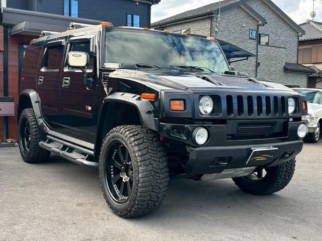 ハマーH2 タイプG 三井物産新車並行車 レザーシート サンルーフ BOSEサウンド バックモニター TV ETC ヒッチメンバー ランチョショックアブソーバー 社外マフラー 社外22インチアルミホイール 保証書 スペア(4枚目)