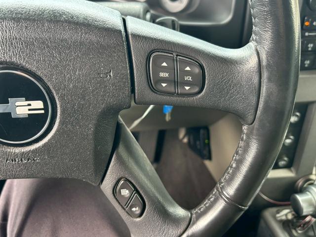 ハマーH2 タイプG 三井物産新車並行車 レザーシート サンルーフ BOSEサウンド バックモニター TV ETC ヒッチメンバー ランチョショックアブソーバー 社外マフラー 社外22インチアルミホイール 保証書 スペア(26枚目)