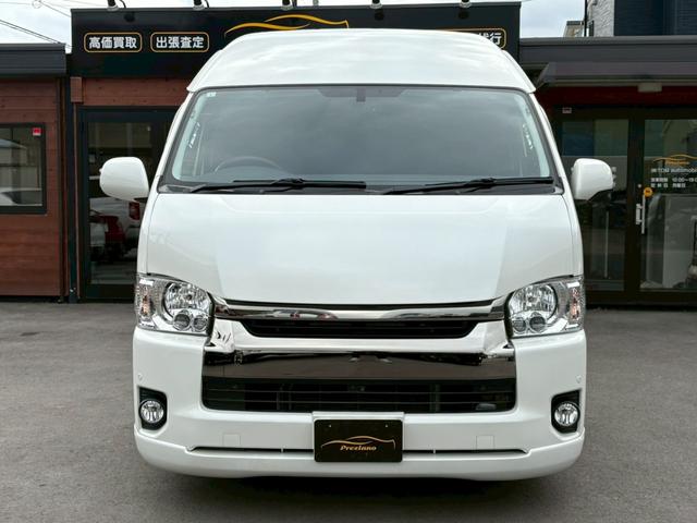 ハイエースワゴン グランドキャビン 8ナンバー登録(3ナンバー対応) ベッドキット ローダウン オーバーフェンダー 社外ボンネット 社外テール パワースライドドア LEDヘッドライト 社外20インチアルミ 社外ナビ フルセグTV(2枚目)