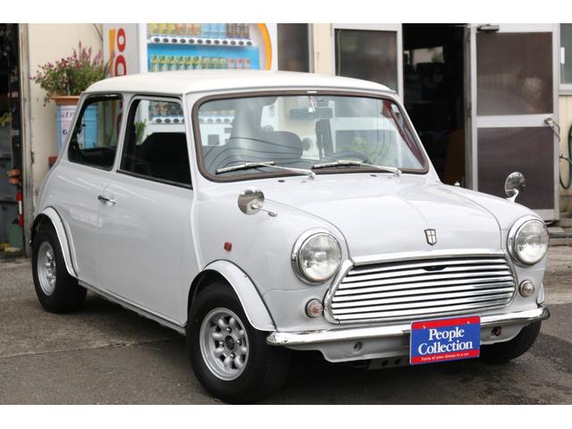 ＭＩＮＩ １．３　４速マニュアル　ＳＵツインキャブ　左ハンドル　センターメーター　１０インチアルミホイール　ナルディステアリング　センターキー　ハイローキット　コイルサス　車検令和８年１２月　クーラー付き　ＥＴＣ（3枚目）