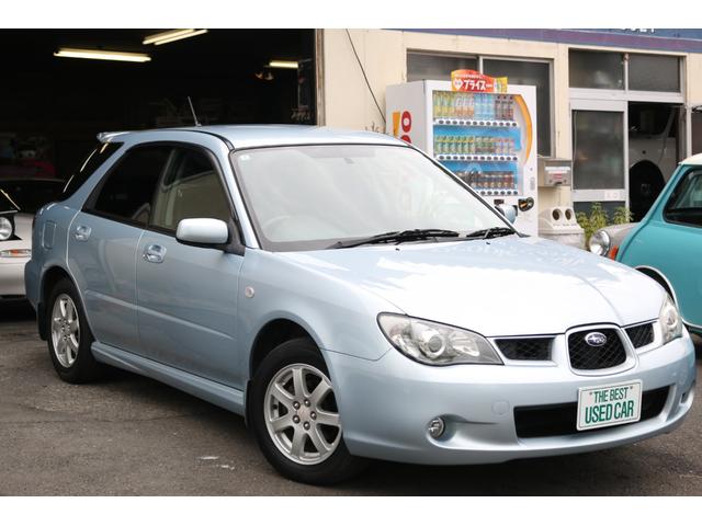 インプレッサスポーツワゴン 15i 5速マニュアル 走行距離48000キロ EJ15水平対向エンジン キーレス スペアキー ETC オートエアコン 純正15インチアルミ 鷹目インプ アクアブルーメタリック フォグランプ ルーフスポイラー(3枚目)