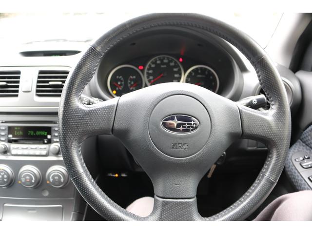 インプレッサスポーツワゴン 15i 5速マニュアル 走行距離48000キロ EJ15水平対向エンジン キーレス スペアキー ETC オートエアコン 純正15インチアルミ 鷹目インプ アクアブルーメタリック フォグランプ ルーフスポイラー(12枚目)